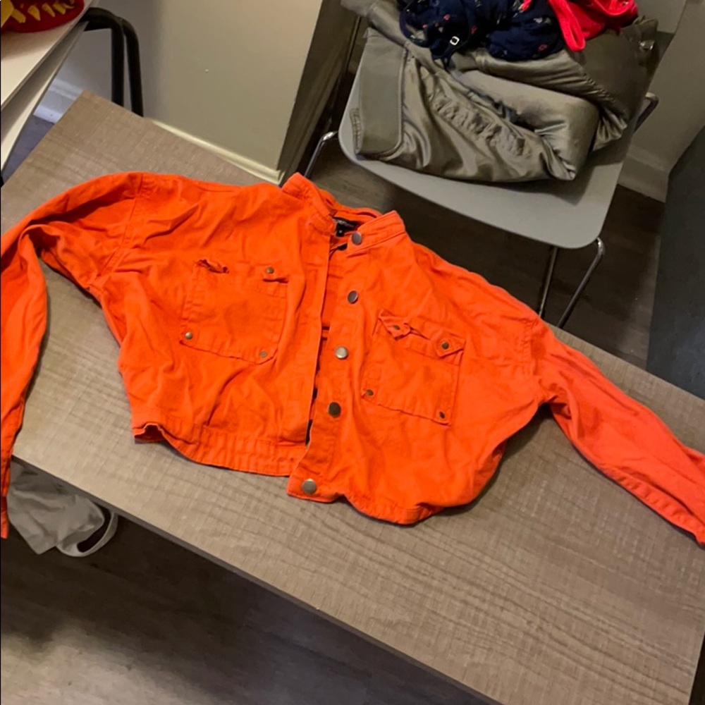 A orange crop Jean jacket